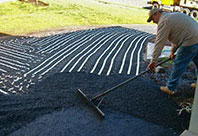 Radiant heat cable installed for new asphalt heated driveway.
