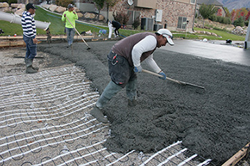 Installing a heated driveway in concrete.