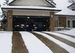 Heated driveway with dual track configuration.